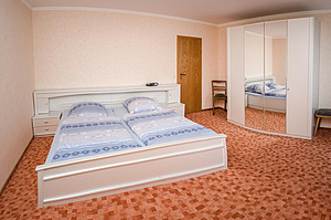 Schlafzimmer - Ferienwohnung Heidelbeere